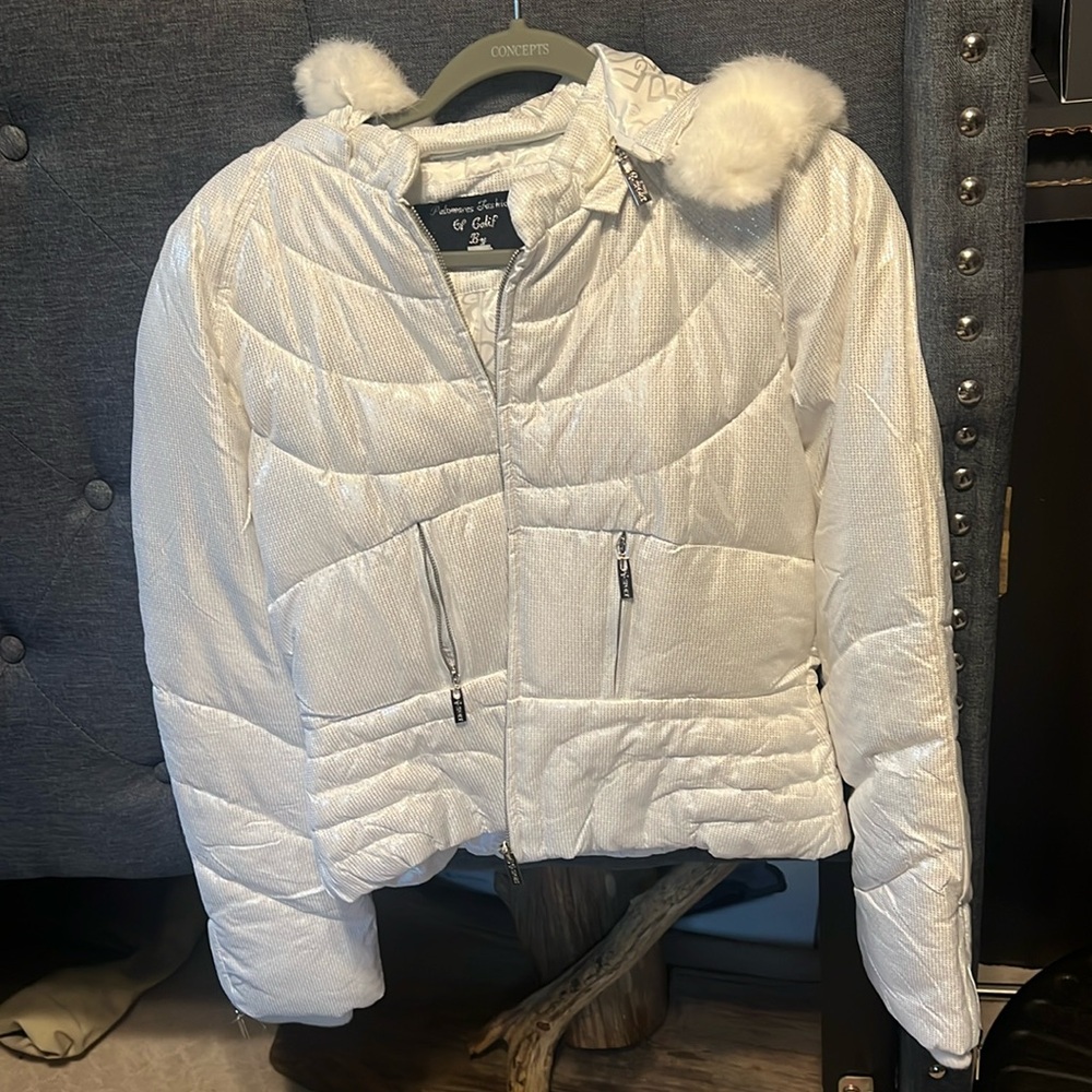 White and silver fur lined hooded light ski jacket. Medium - fits like a small